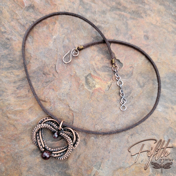 Intertwined copper garnet heart necklace fifth energy jewelry