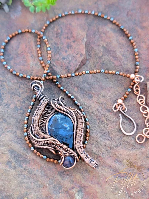Arfvedsonite and Iolite Necklace wrapped in copper. Fifth Energy Jewelry