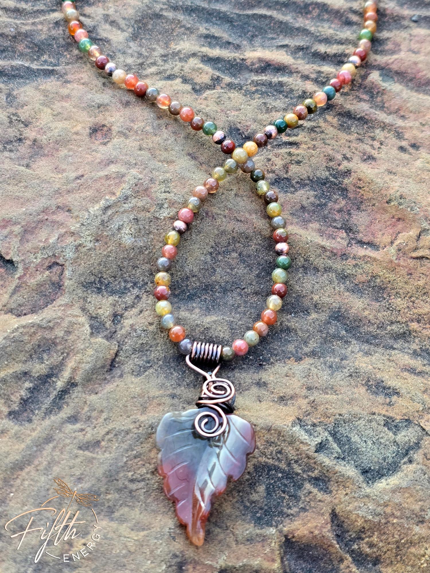Warm Indian Agate Carved Leaf Necklace 4 One-of-a-kind Warm Indian Agate Carved Leaf Necklace featuring a hand-carved agate leaf pendant and pure copper bail on a beaded agate cord.