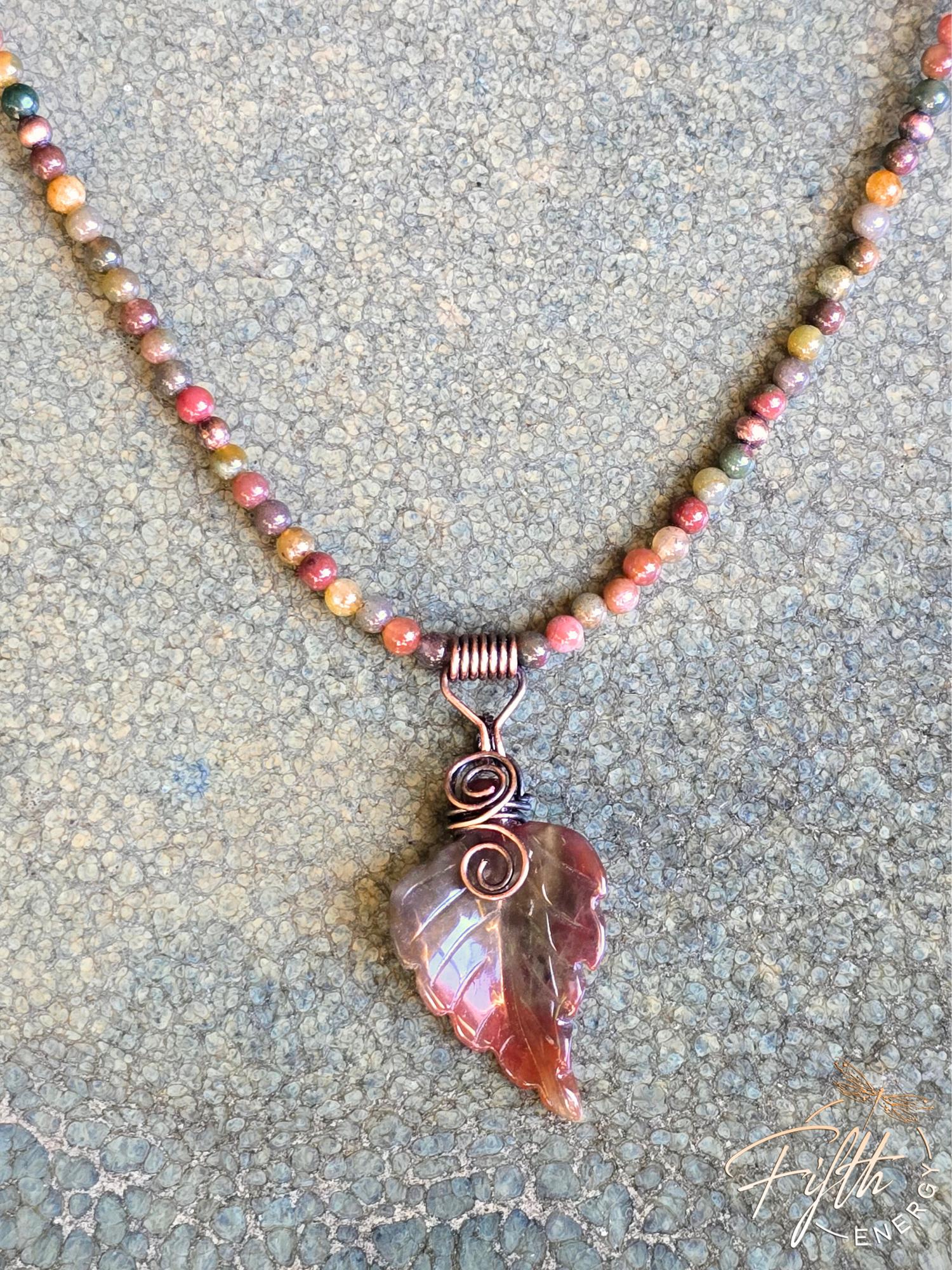 Warm Indian Agate Carved Leaf Necklace 8 Artisan-crafted Indian Agate leaf necklace with warm-toned gemstone beads and a hand-formed copper bail, perfect for nature lovers.