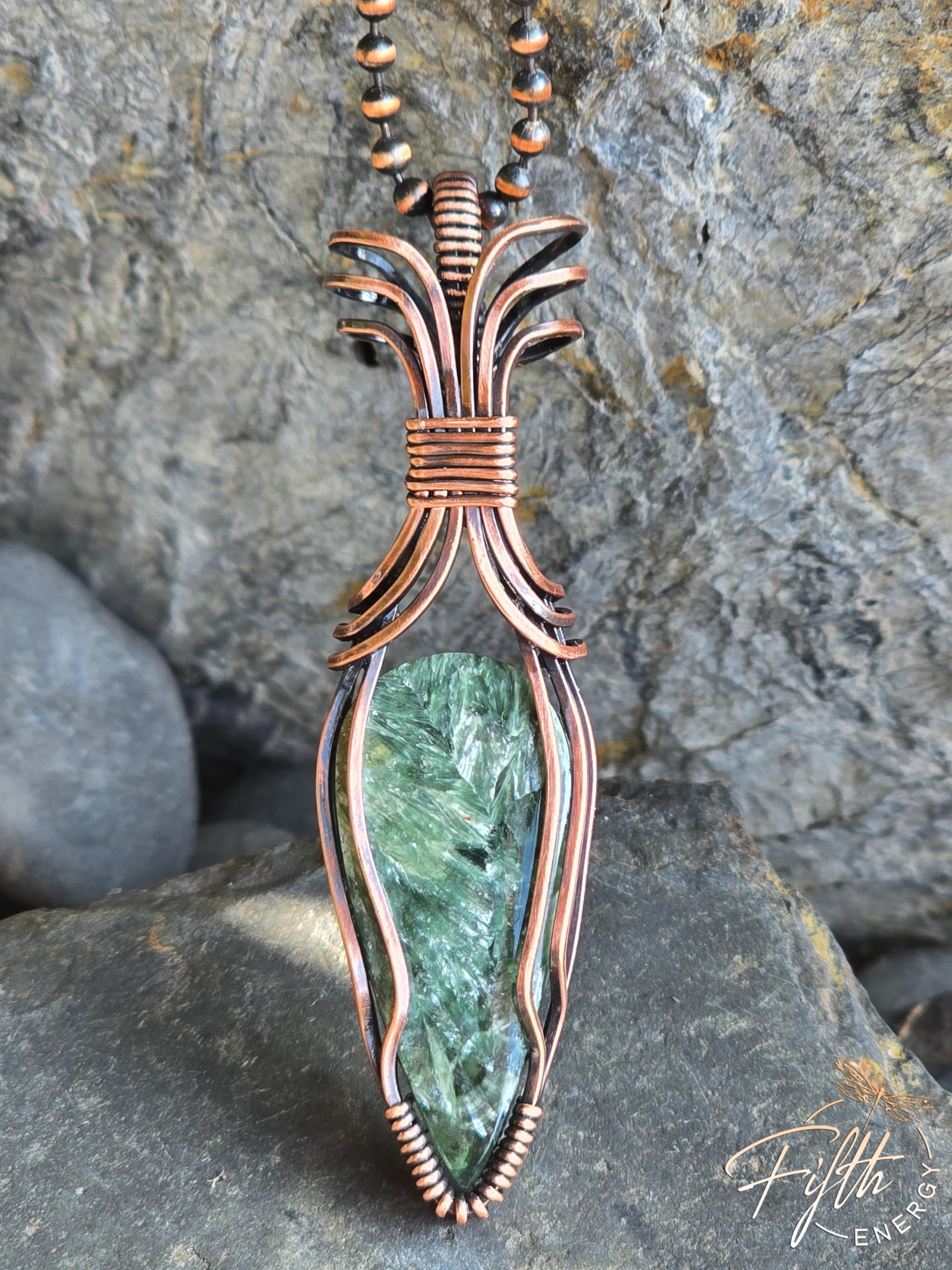 Seraphinite Necklace 7 Explore the Seraphinite Necklace by Fifth Energy Jewelry, crafted with a shimmering deep green gemstone and American-made copper.