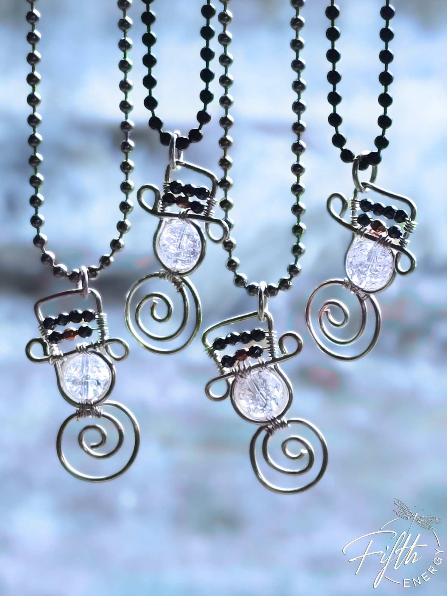 Crackled Quartz Snowman Necklace | Winter Jewelry Gift 2 Handmade whimsical snowman necklace with crackled quartz and hematite accents wrapped in silver-plated copper wire.