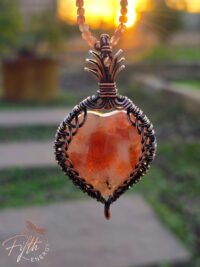 Heart Sunstone Copper Necklace Fifth Energy Jewelry in Garden Setting
