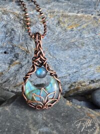 Labradorite lotus moon pendant necklace featuring moon-shaped gemstone and sacred lotus design, handcrafted copper jewelry